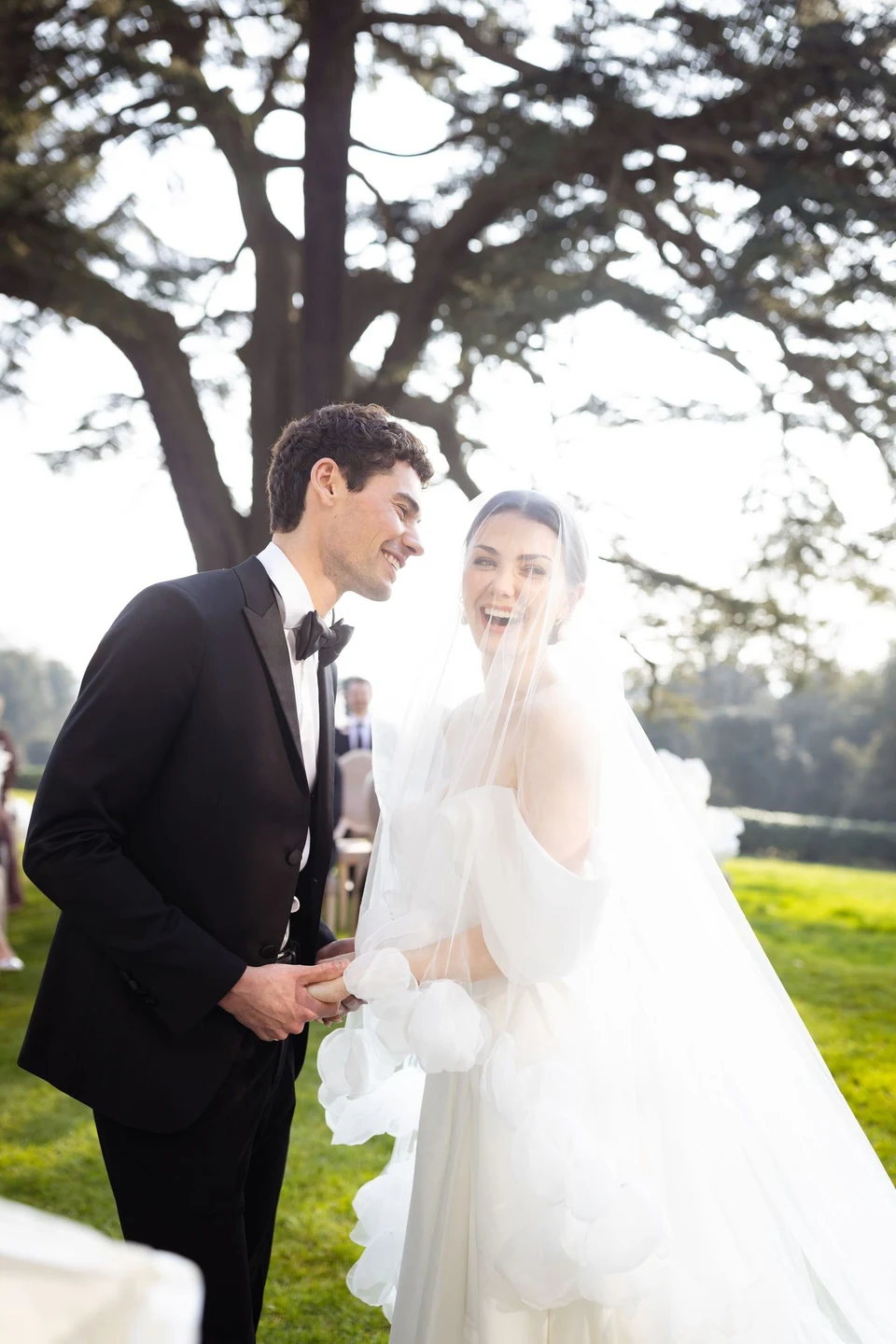 Pen and Joe laughing together beneath a tree at Hedsor House — Buckinghamshire