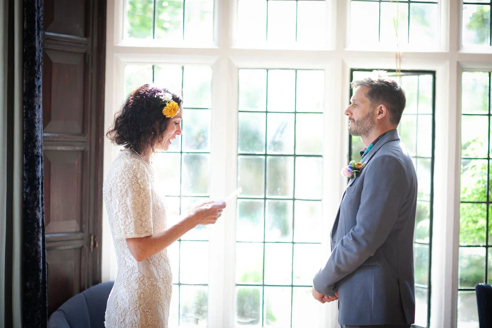 Catherine and Nick exchanging vows at Lewes Register Office — Sussex